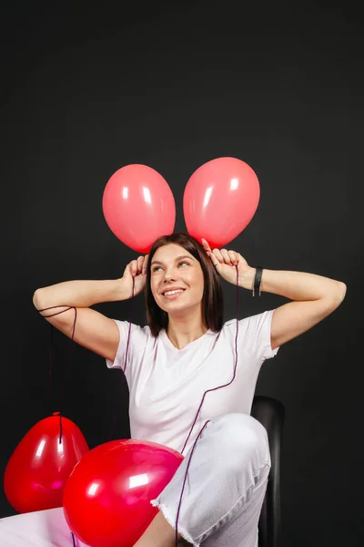 Portrait Emotional Young Brunette Light Clothing Holding Red Balloons Bunny —  Fotos de Stock