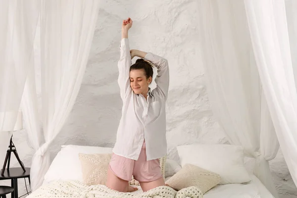 Pretty Brunette Girl Woke Morning Stretches Her Bed Hair Tied — 스톡 사진