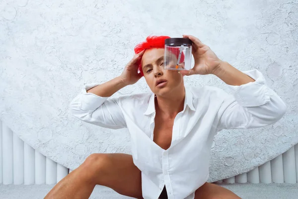 Woman Short Bright Red Hair Sitting Floor White Room Holding —  Fotos de Stock