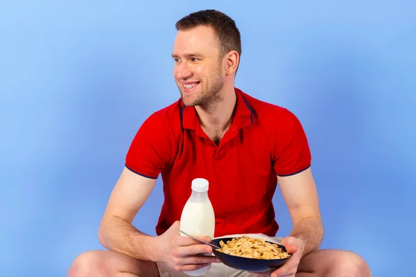 Young Handsome Healthy Man Red Polo Shirt Holding Bowl Cereal — Stock Photo, Image