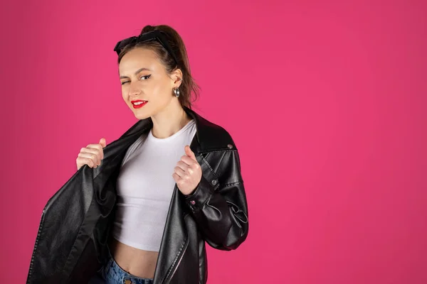 Cool Biker Girl Wearing Leather Jacket Jeans Isolated Pink Background — Stock Photo, Image