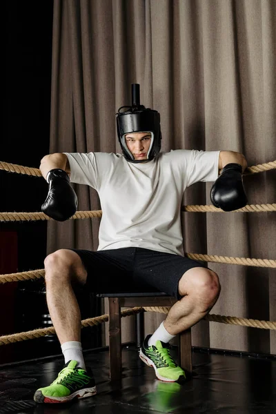 Big Guy Sits Corner Boxing Ring Wearing Black Head Guard — Stock Photo, Image