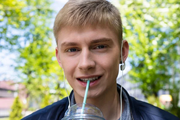 Young Blond Man Casual Clothes Earphones Enjoys First Sunny Days — Stock Photo, Image