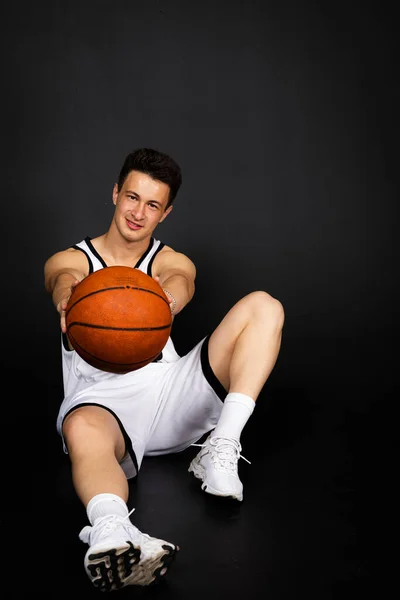Handsome Young Basketball Player White Sportswear Sits Floor Posing Ball — Stock Photo, Image