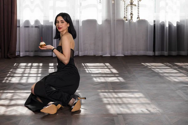 stock image portrait Elegantly dressed young beautiful girl with black hair and dress celebrating 18th birthday. formal party meeting celebrating.