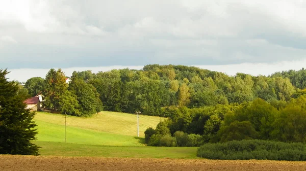 Empty field, autumn in Kashubian Region, Poland.Travel and agriculture concept.