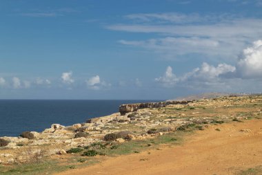 Cliffs in Malta. The Marfa Peninsula is located in the north of the island. clipart