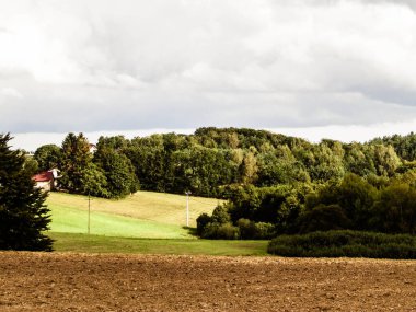 Empty field, autumn in Kashubian Region, Poland.Travel and agriculture concept.