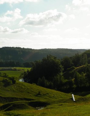 Pastures in the Wiezyca Region. Mountainous landscape. Wiezyca is part of Kashubia region in northern Poland. clipart