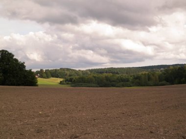 Field ag forest - landscape of Kashubian Region, Poland. Travel and nature concept.