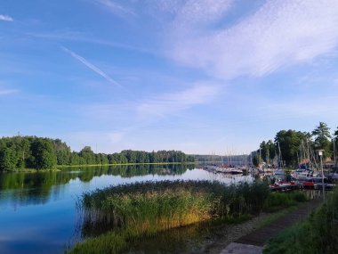 Marina on Wdzydze Lake. Kashubia Poland. Wdzydze or Wdzydzkie Lake is one of most popular and the biggest lakes in Poland clipart