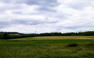 Fields and meadows of Wiezyca. Wiezyca is popular touristic region of Kashubia Region. Poland clipart