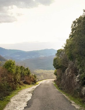 Road across Rumija Mountains near Lake Skadar. Montenegro outside the tourist season. clipart