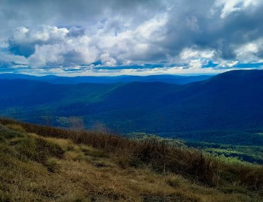 Beautiful view of Bieszczady from top of the mountain. Mountain tourism. clipart