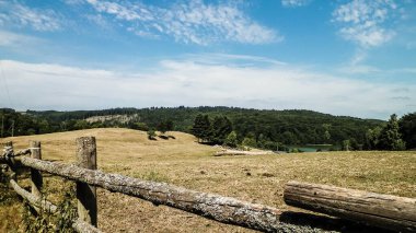 Landscape of ranch in Wiezyca region, Kashubia, Poland. Agriculture and travel concept. clipart