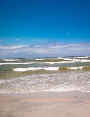 Baltic Sea. Copy space on blue sky. clipart