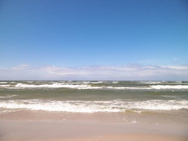 Baltic Sea. Copy space on blue sky. clipart