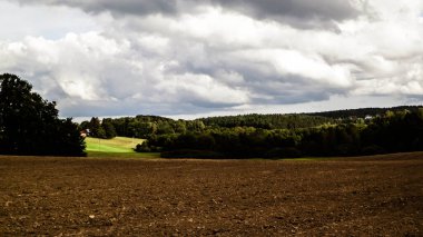 Field ag forest - landscape of Kashubian Region, Poland. Travel and nature concept.