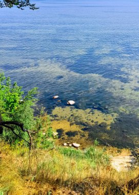Seascape of Baltic Sea crystal water, from coastal cliffs. Oslonino. Poland.