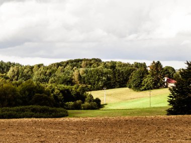 Empty field, autumn in Kashubian Region, Poland.Travel and agriculture concept.
