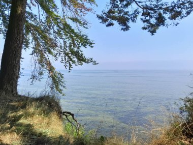 Seascape of Baltic Sea crystal water, from coastal cliffs. Oslonino. Poland.