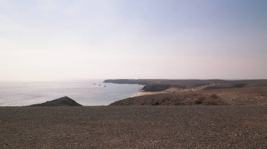 Cliff near Popagayo Beach. Lanzarote Island. Canarian Archipelago. Popular touristic attraction.