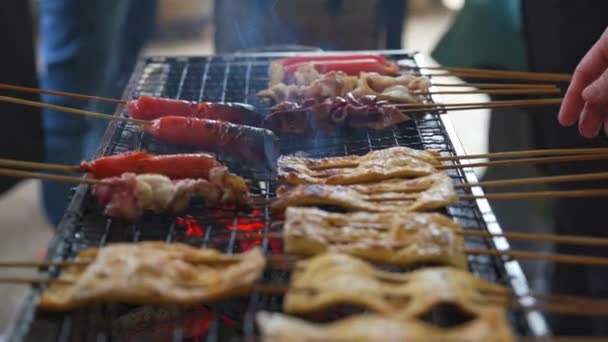 Group People Grilling Front Charcoal Stove Grilling Various Ingredients — Wideo stockowe