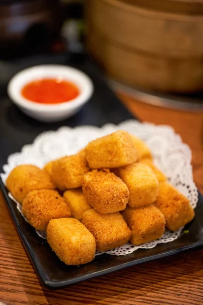 A plate of golden fried tofu
