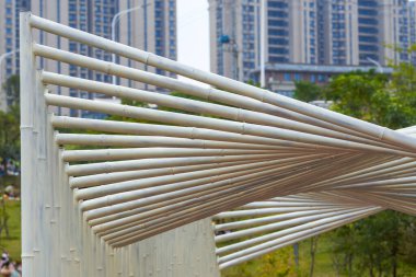 Close-up of steel pipe sculpture in the park