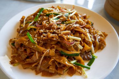 A plate of dry fried beef hor fun