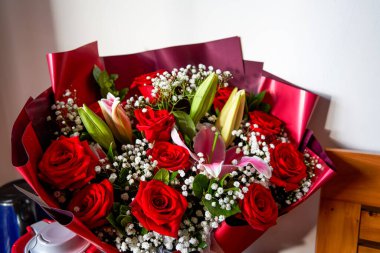 Close-up of a beautiful romantic bouquet of red roses on Valentine's Day