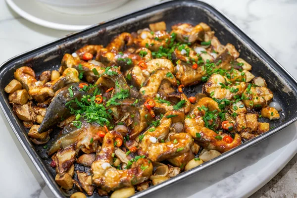 stock image A plate of delicious and spicy Braised Catfish in Hunan Sauce