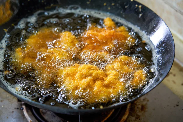 stock image Delicious chicken chops are being fried in the kitchen oil pan