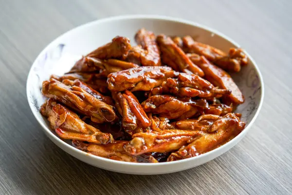 A delicious Chinese home-cooked dish, Braised Chicken Wings in Sauce