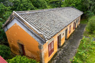 Longzhou 'da, Guangxi' de, Çin 'de, Yexiu Bahçesi' nde, Qing Hanedanlığı 'nın sonlarındaki güneydeki yerleşim birimlerinde.