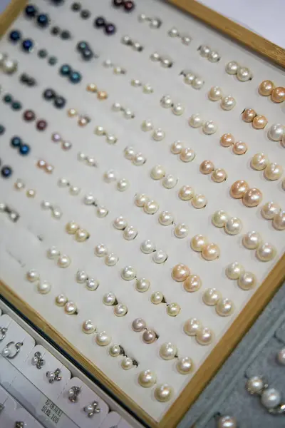 Close-up of pearl jewelry for sale in store