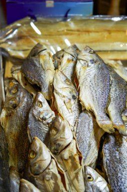 Close-up of salted fish sold at a Chinese New Year market clipart