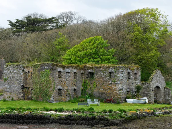 The Arundel grain store, shore of Clonakilty Bay. An stone building in Ireland, Europe. Historical architectural monument, landscape. Tourist attractions in Ireland