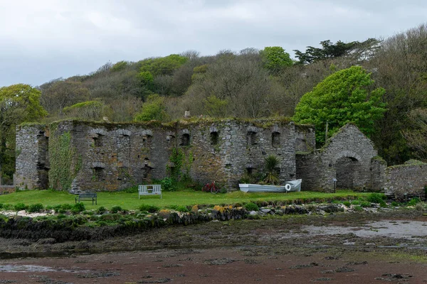 The Arundel grain store, shore of Clonakilty Bay. An stone building. Historical monument. Tourist attractions