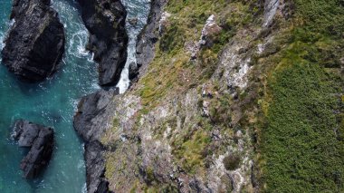 Seashore, view perpendicular from above. Beautiful sea rocks. The edge of the Atlantic Ocean. A natural attraction. Drone point of view.