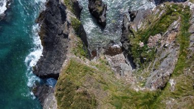 Seashore, view perpendicular from above. Beautiful sea rocks. The edge of the Atlantic Ocean. A natural attraction. Aerial photo. View from above.