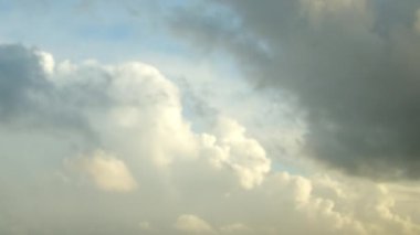 Time-lapse video of clouds moving rapidly in the morning sky