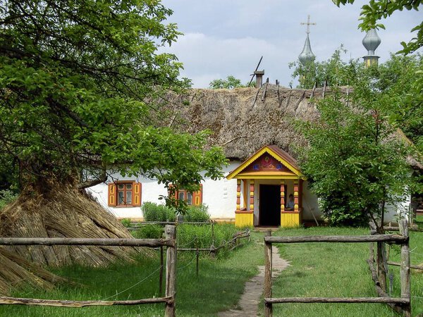 The Museum of Folk Architecture and Everyday Life of the Middle Dnieper region showcases an aged Ukrainian house.