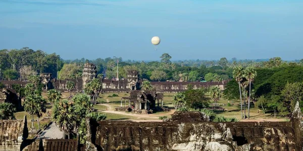 stock image Balloon over Angkor temple ruins in Cambodia.