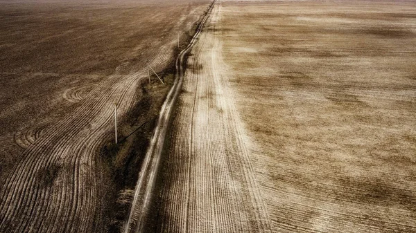 Feldweg Zwischen Ackerflächen Luftaufnahme Landschaft Ackerflächen Frühjahr Strommasten — Stockfoto