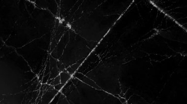 Siyah kağıt tozlu buruşuk doku ve soyut buruşuk desen. Tek renkli karton kırışıklıklar. Makro. Döndürme. Üst görünüm