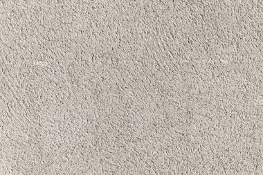 Sert kumlu dış kaplama kaplama duvar. Soyut alçılı bina arkaplanı