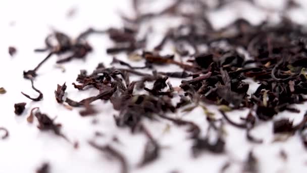 Thyme Black Tea Dried Leaves Falling Slow Motion White Saucer — Stock Video