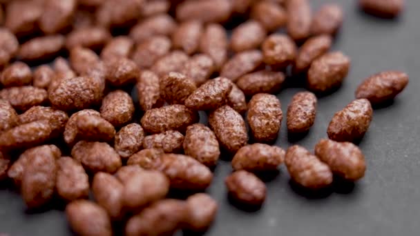 Chocolate Cereal Puffed Rice Grains Black Background Close Crunchy Healthy — Stock video