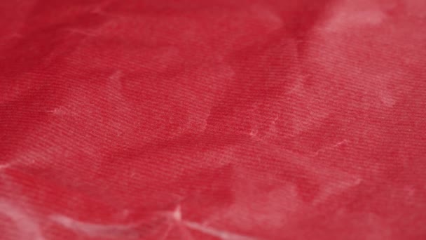 Crumpled Red Gift Wrapping Paper Texture Close Abstract Background Rotation — Wideo stockowe